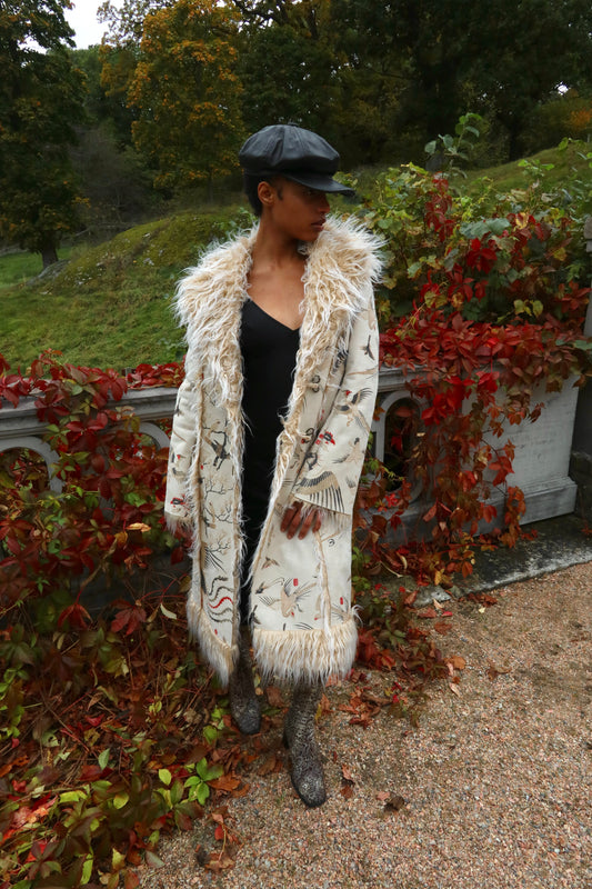 2005’s Roberto Cavalli faux fur cream coat