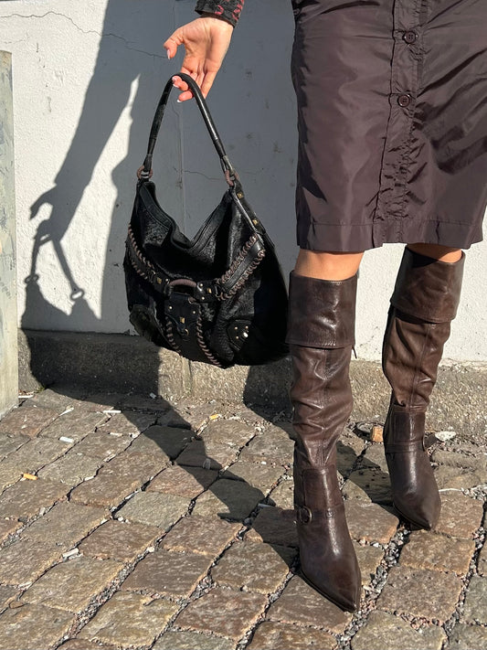 Cole Haan cow and leather buckle bag