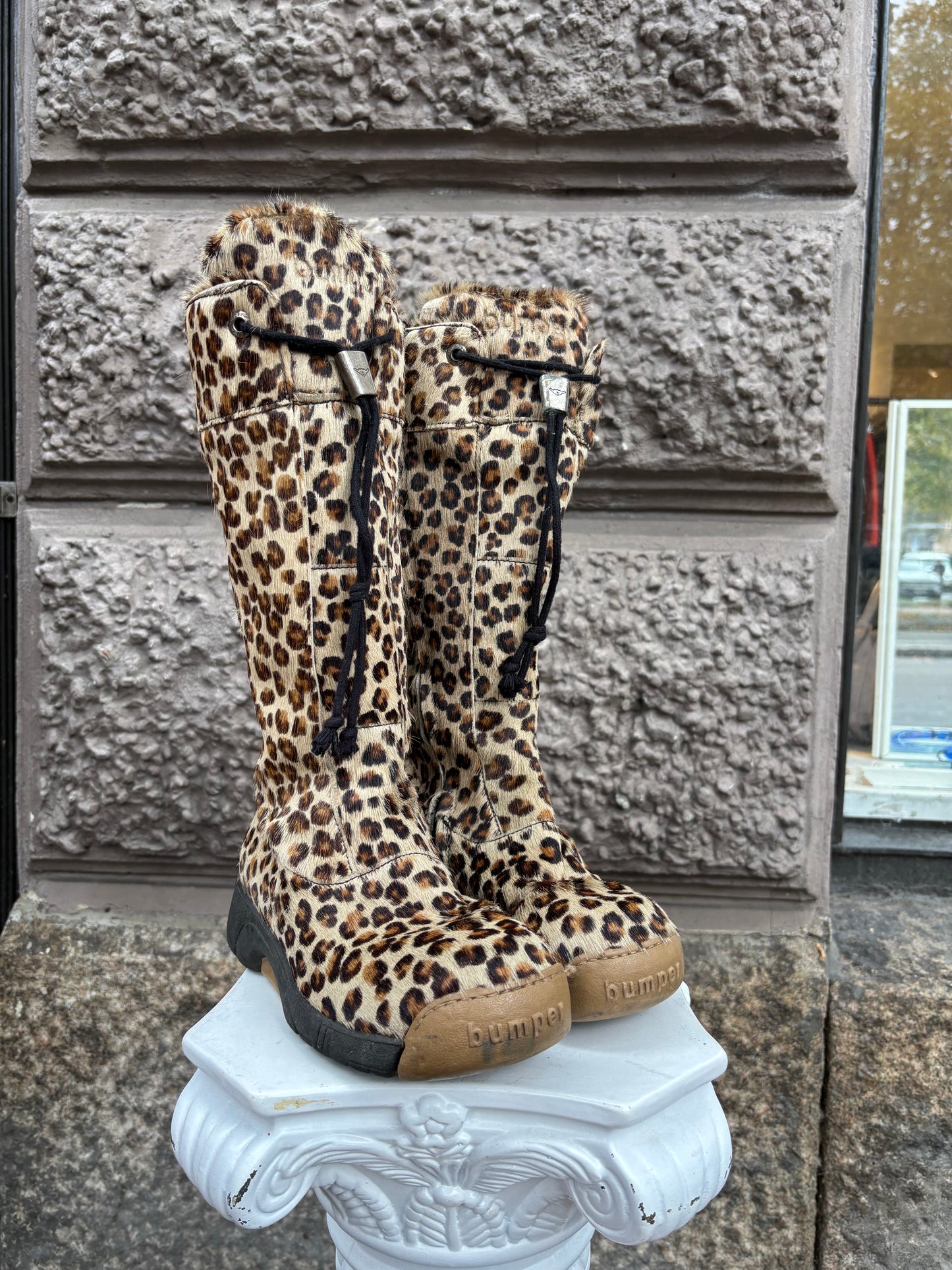 Bumper leopard print knee-high boots