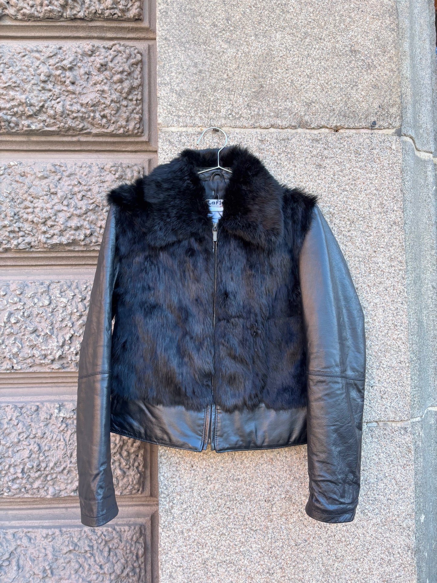 Leather jacket with fur details