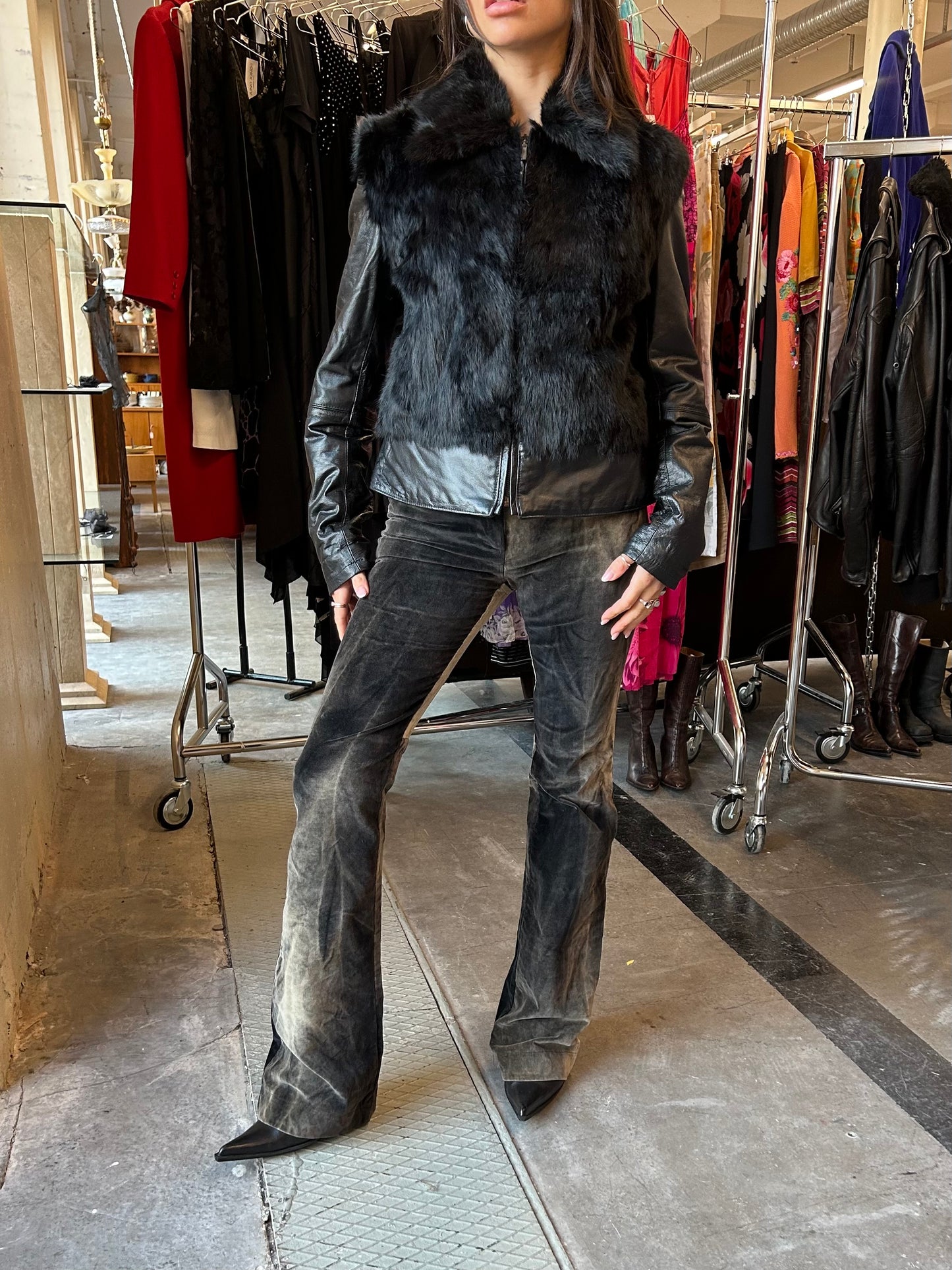 Leather jacket with fur details
